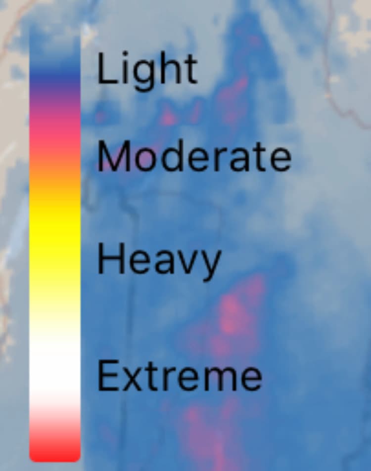 A useless color-code for weather radar, reading 'Light / Moderate / Heavy / Extreme', with corresponding colors in a progressing gradient, except that as the code moves toward 'Extreme' the color becomes white, and then pink, which is the same pink as 'Moderate'.