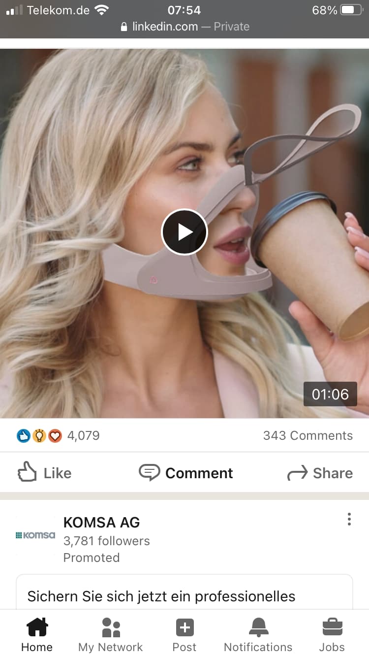 Screenshot of a LinkedIn post, with an image of pretty, corporate-looking woman with a strange plastic facemask around the base of her face, nose and chin. The mask part is lifted up at a hinge above the nose, so that she can take a sip of her to-go coffee. She looks to right at something off camera.
