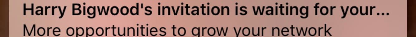 Screenshot of an iOS notification that reads, 'Harry Bigwood's invitation is waiting for your... More opportunities to grow vour network'